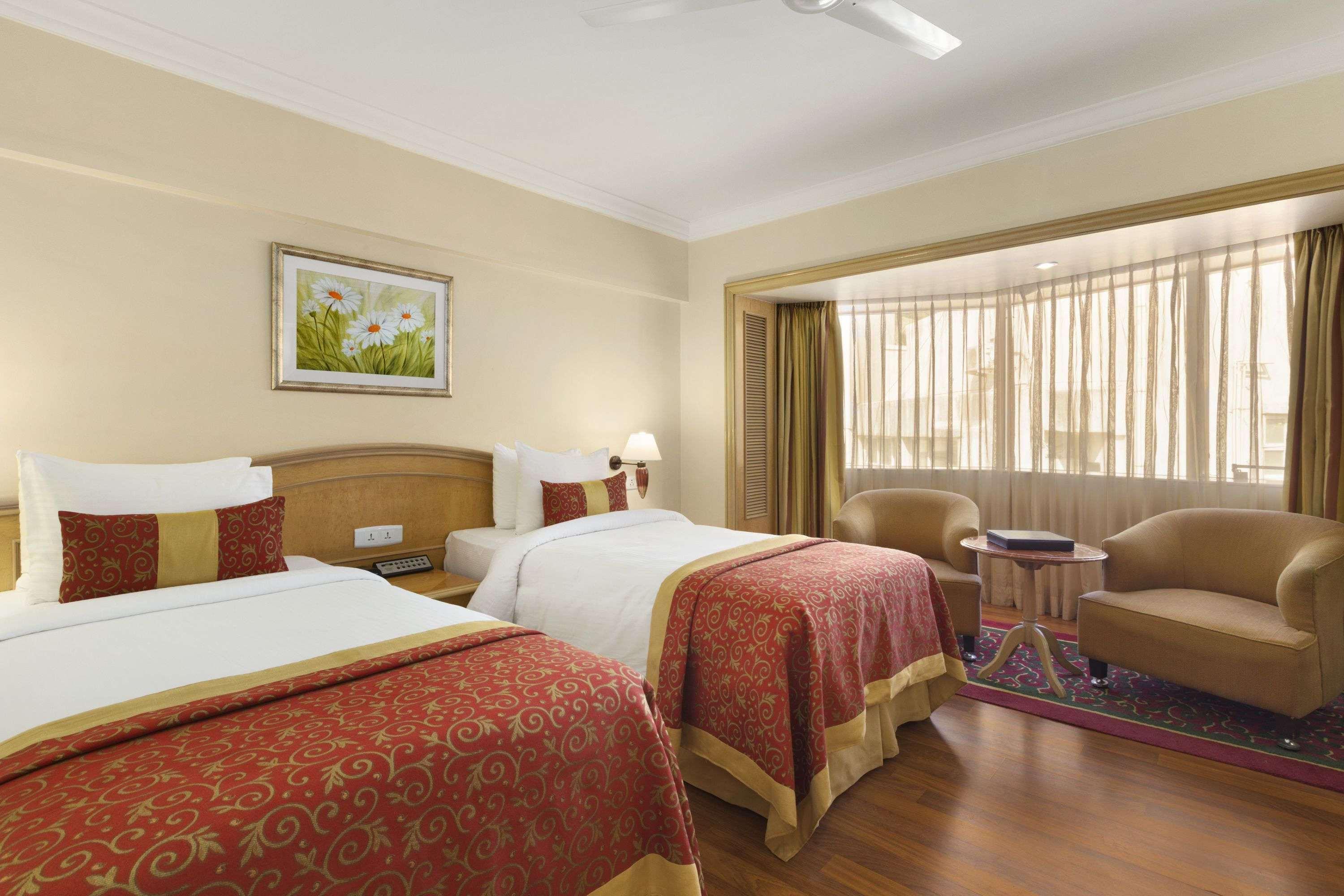 Hotel Ramada Plaza By Wyndham Palm Grove Mumbai Exterior foto A room at the Taj Bengal
