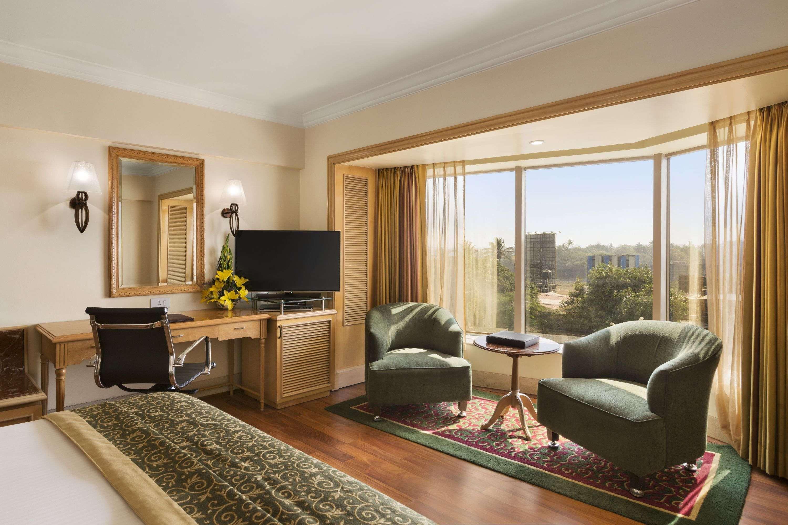 Hotel Ramada Plaza By Wyndham Palm Grove Mumbai Exterior foto A room at the Taj Bengal