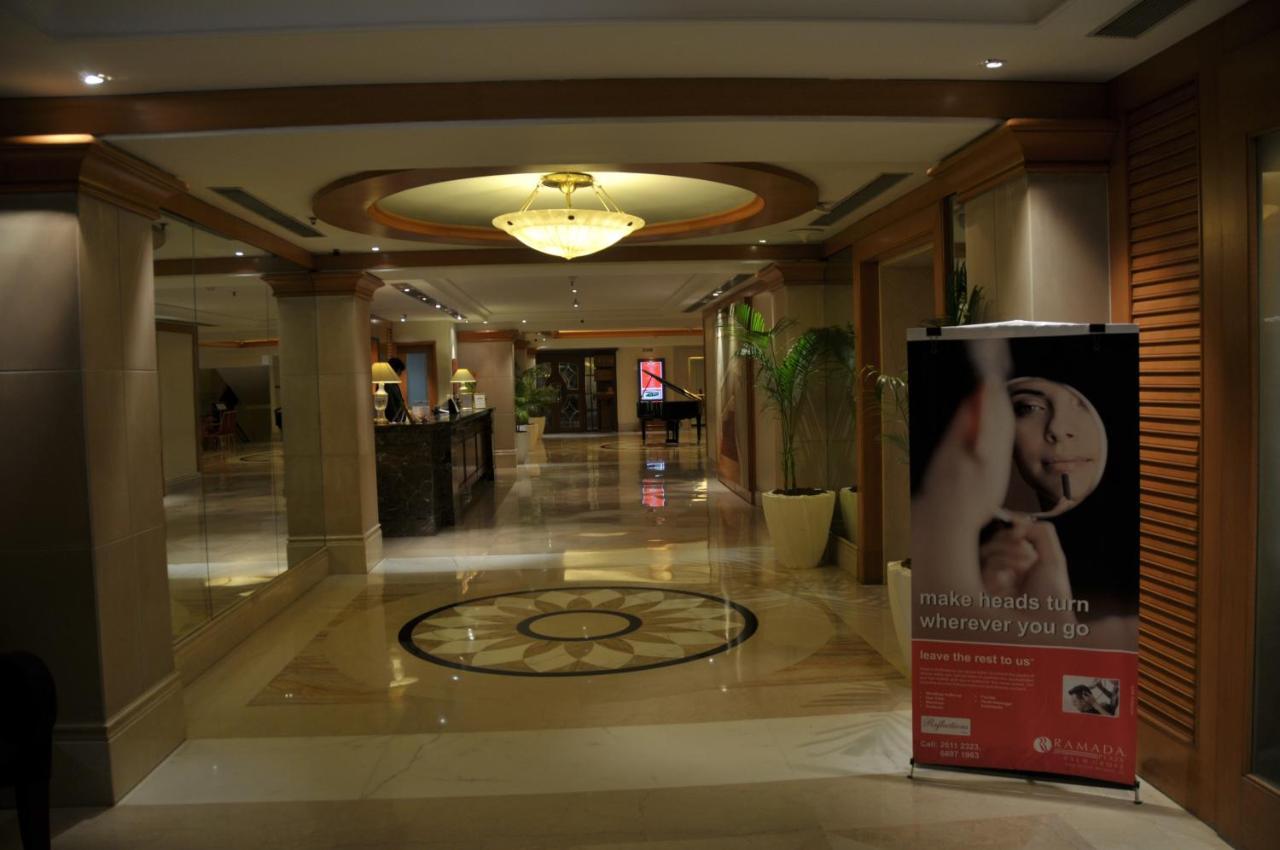 Hotel Ramada Plaza By Wyndham Palm Grove Mumbai Exterior foto Lobby