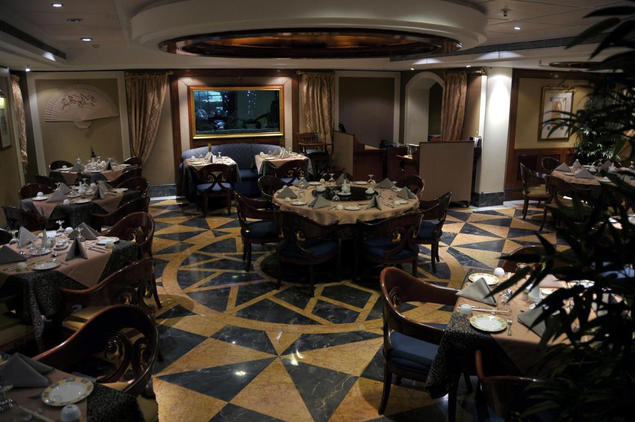 Hotel Ramada Plaza By Wyndham Palm Grove Mumbai Exterior foto The restaurant